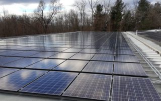 The TigerPress building roof covered with solar panels.